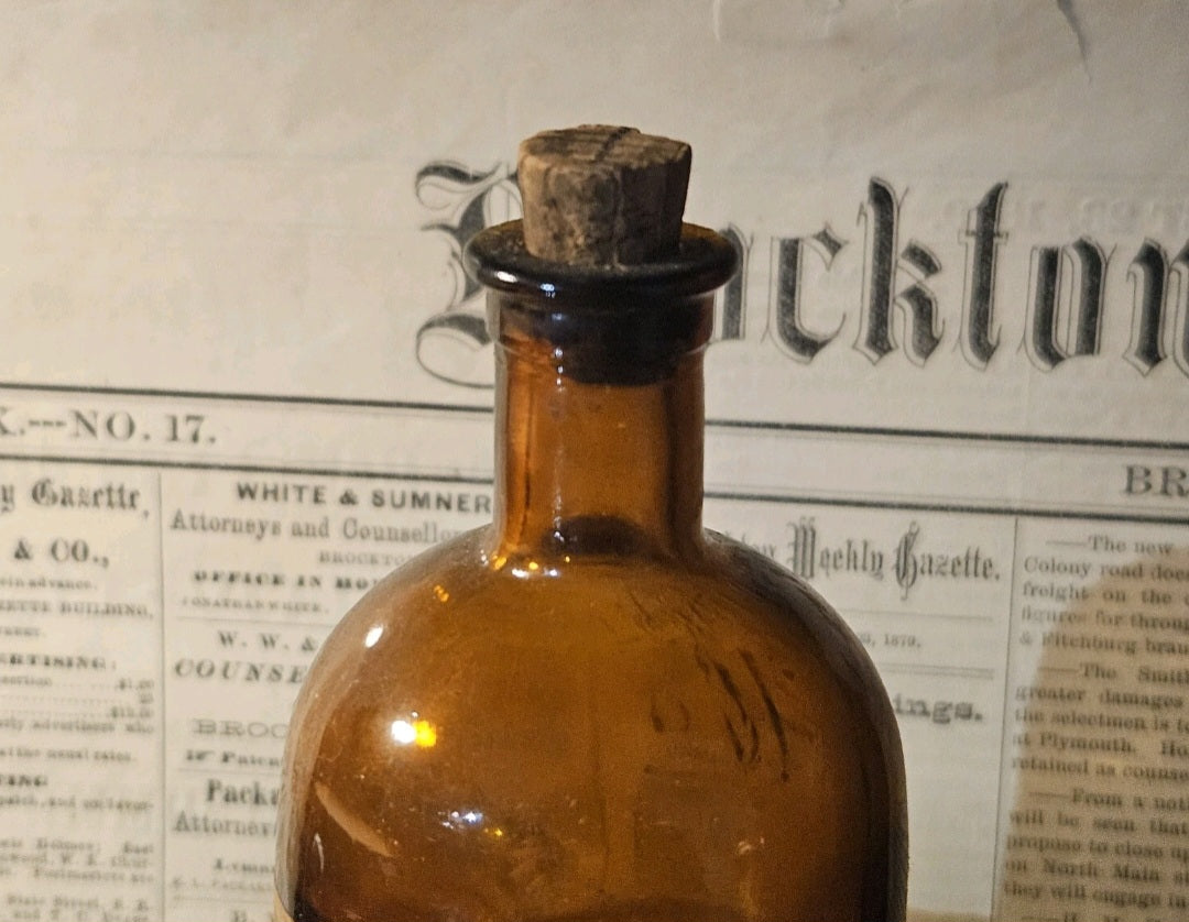 Antique Oil of Nutmeg Amber Medicine Bottle