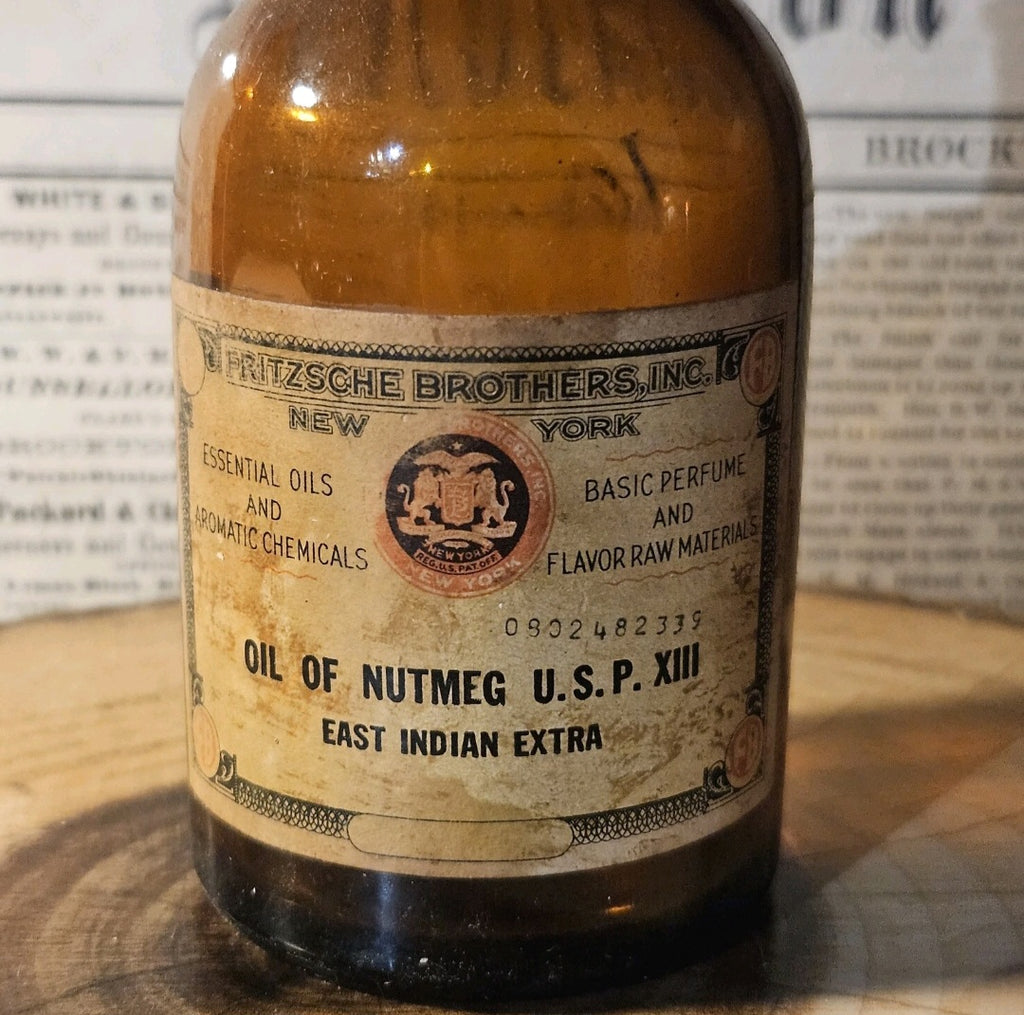 Antique Oil of Nutmeg Amber Medicine Bottle