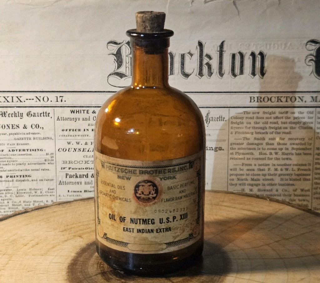 Antique Oil of Nutmeg Amber Medicine Bottle