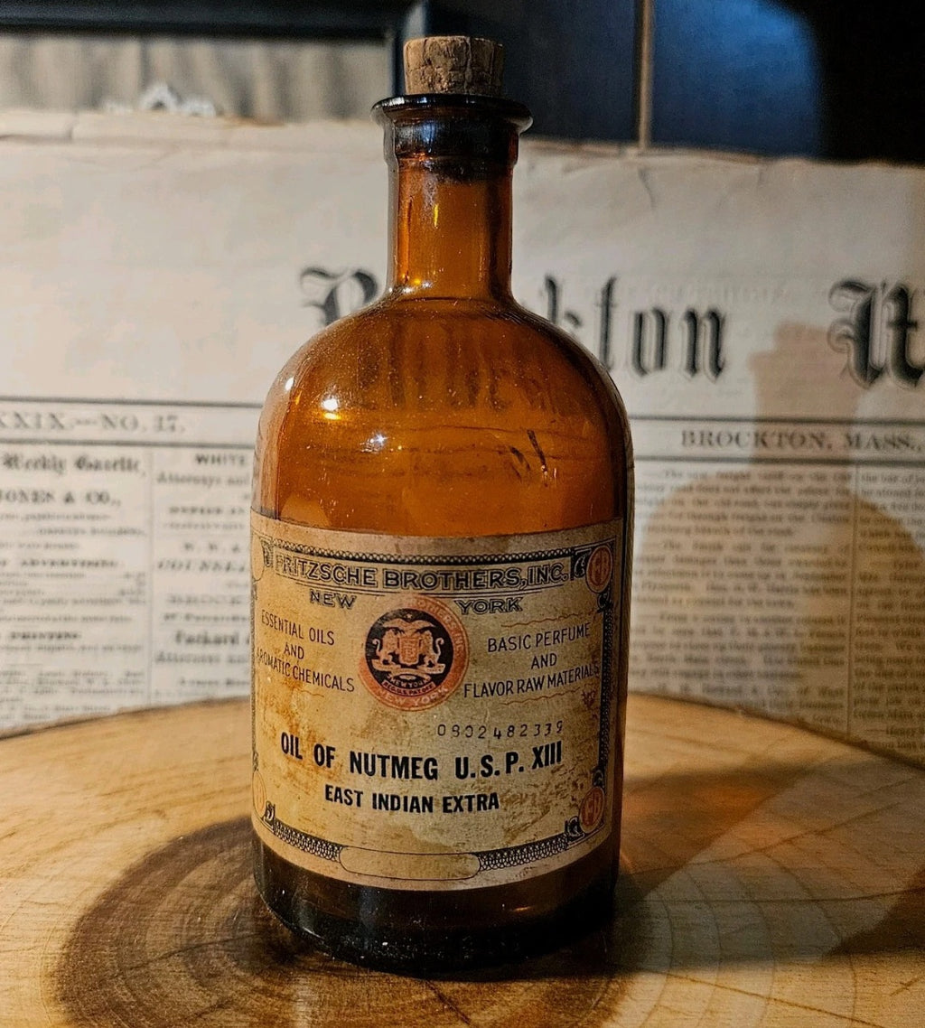 Antique Oil of Nutmeg Amber Medicine Bottle