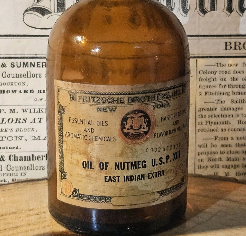 Antique Oil of Nutmeg Amber Medicine Bottle